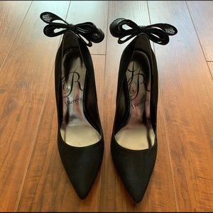 Black pumps w/ mesh polka dot bows on the back!